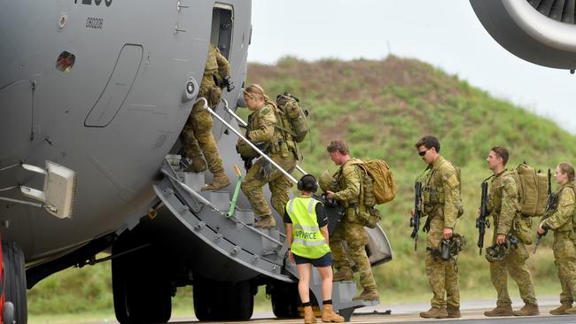 Townsville-based soldiers board a C-17 Galaxy at RAAF Townsville for the Solomon Islands last year. Picture: Evan Morgan