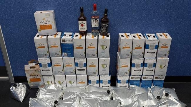 Police seized 54 casks of wine and three bottles of liquore from an Alice Springs home. Picture: Supplied.