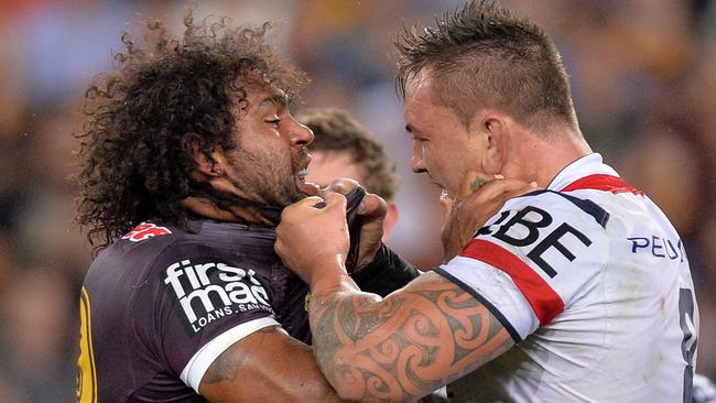 Sam Thaiday and Jared Waerea-Hargreaves face off.