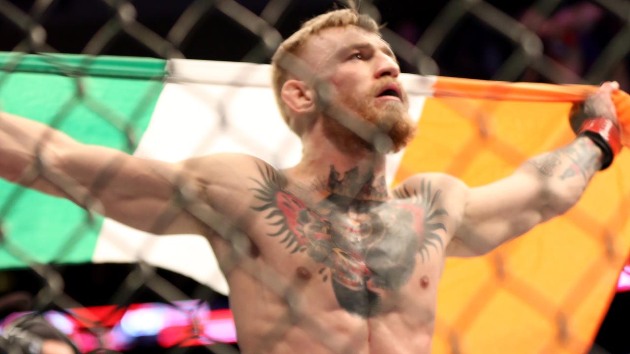 Conor McGregor, of Ireland, celebrates a win against Dennis Siver, of Germany, after their featherweight fight at UFC Fight Night, Sunday, Jan. 18, 2015 in Boston. McGregor won via 2nd round TKO. (AP Photo/Gregory Payan)