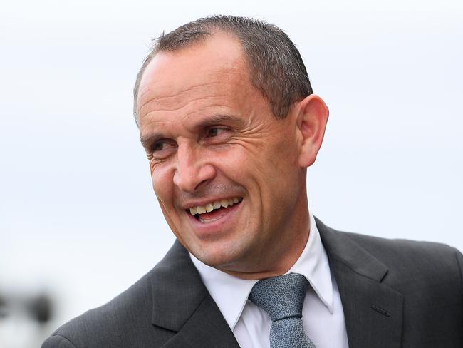 Trainer Chris Waller speaks with jockey James McDonald after he rode Verry Elegant to victory in race 6, the Kia Tancred Stakes, during Stakes Day at Rosehill Gardens Racecourse in Sydney, Saturday, March 28, 2020. (AAP Image/Dan Himbrechts) NO ARCHIVING, EDITORIAL USE ONLY