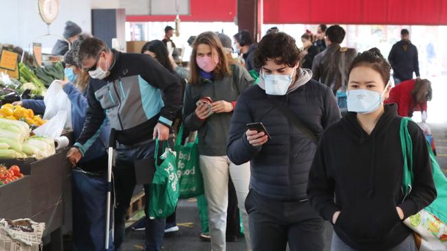 Victoria market shoppers during the second COVID-19 lockdown in Melbourne. Picture: David Crosling