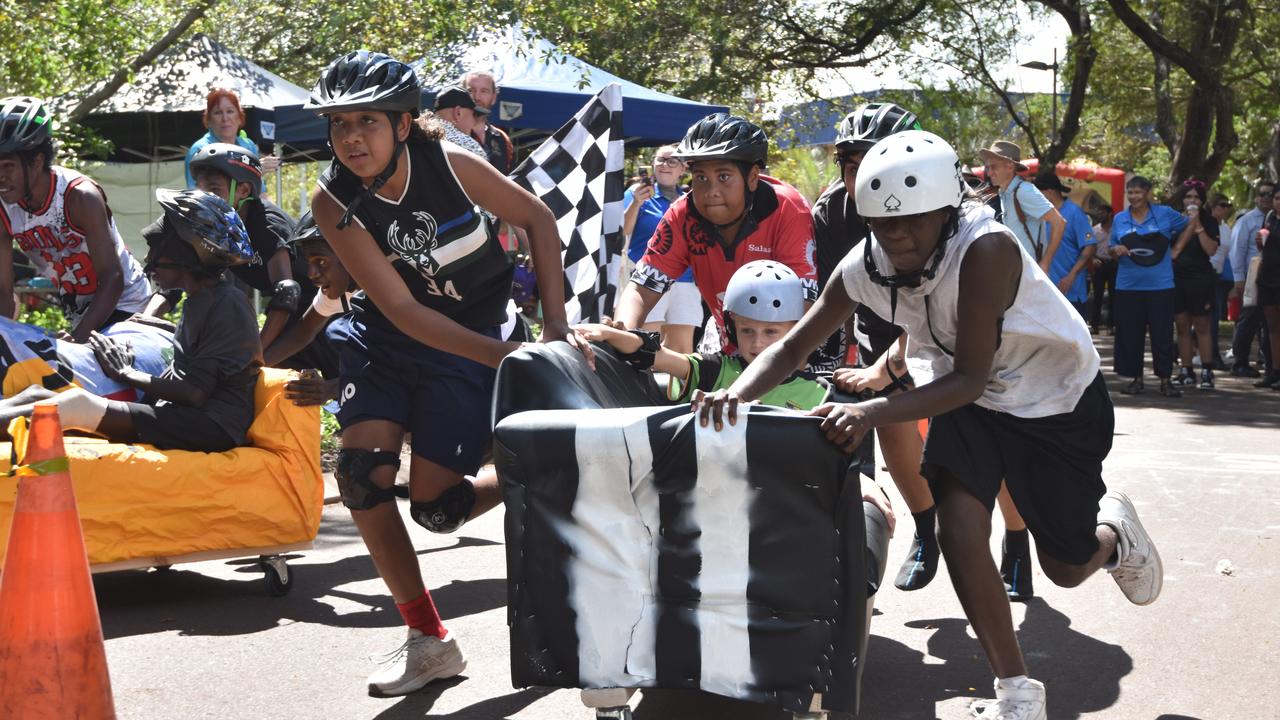 The 'Palmy Army' from the Palmerston Youth Drop In Centre, led by Lorenzo Retchford (left) at Anglicare NT and the City of Darwin's Couch Surfing races 2024. Picture: Alex Treacy