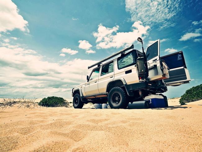 4WD vehicle at beach generic.