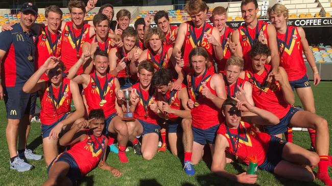 CHAMPIONS: South Australia’s under-16 team celebrates its fifth AFL national championship win since 2010. Picture: @SANFL/Twitter.