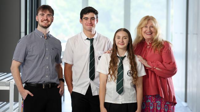 Teacher Nick Houseman, students Lincoln Harrison, 15, and Chelsea Carman, 15, with principal Sharon Amos at Park Ridge State High School. Picture: Liam Kidston