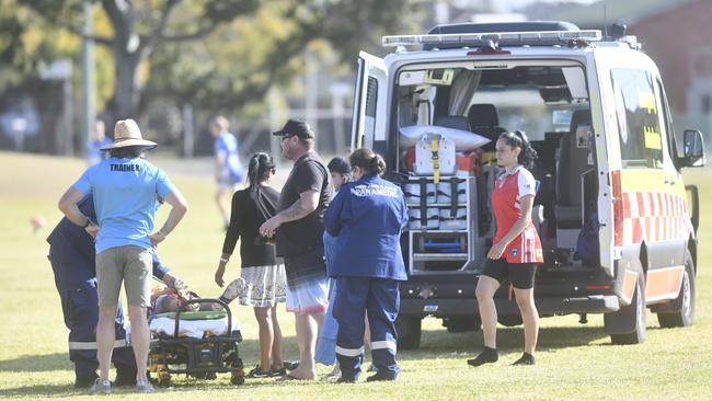 A South Grafton Rebels under-14 junior rugby league player is carted off for a neck injury after a tackle against the Grafton Ghosts at Frank McGuren Field on Saturday, August 29, 2020. Picture: Adam Hourigan