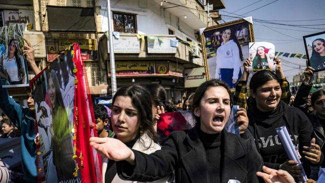 A woman reacts in Syria's northeastern city of Qamishli, at a mass demonstration protesting against a recent wave of sectarian violence targeting the Alawite minority in country’s west, along the Mediterranean Sea coast. Picture: Delil Souleiman / AFP