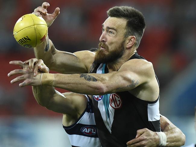 GOLD COAST, AUSTRALIA - AUGUST 14: Charlie Dixon of the Power attempts to mark during the round 12 AFL match between the Geelong Cats and the Port Adelaide Power at Metricon Stadium on August 14, 2020 in Gold Coast, Australia. (Photo by Matt Roberts/Getty Images)