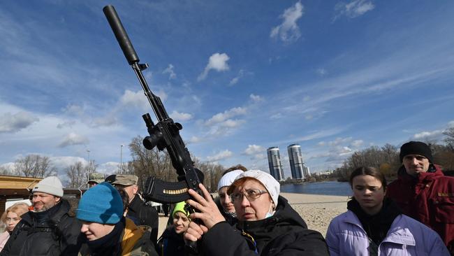 Ukrainians at a training session organised for civilians by war veterans and volunteers who teach the basic of weapons handling and first aid in Kyiv. Picture: AFP