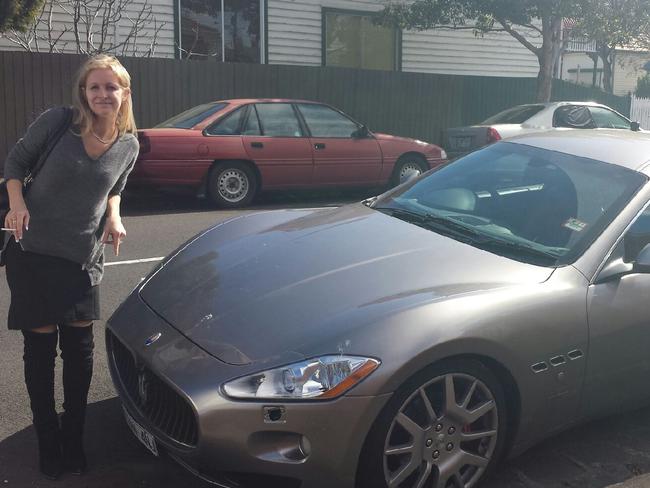 Katherine with Paul Carter's Maserati.