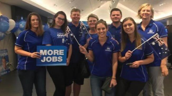 Higgins, front right, with Liberal Party staff.