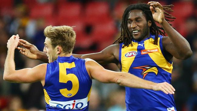 SYDNEY, AUSTRALIA — AUGUST 13: Brad Sheppard and Nic Naitanui of the Eagles celebrate a goal during the round 21 AFL match between the Greater Western Sydney Giants and the West Coast Eagles at Spotless Stadium on August 13, 2016 in Sydney, Australia. (Photo by Mark Nolan/Getty Images)