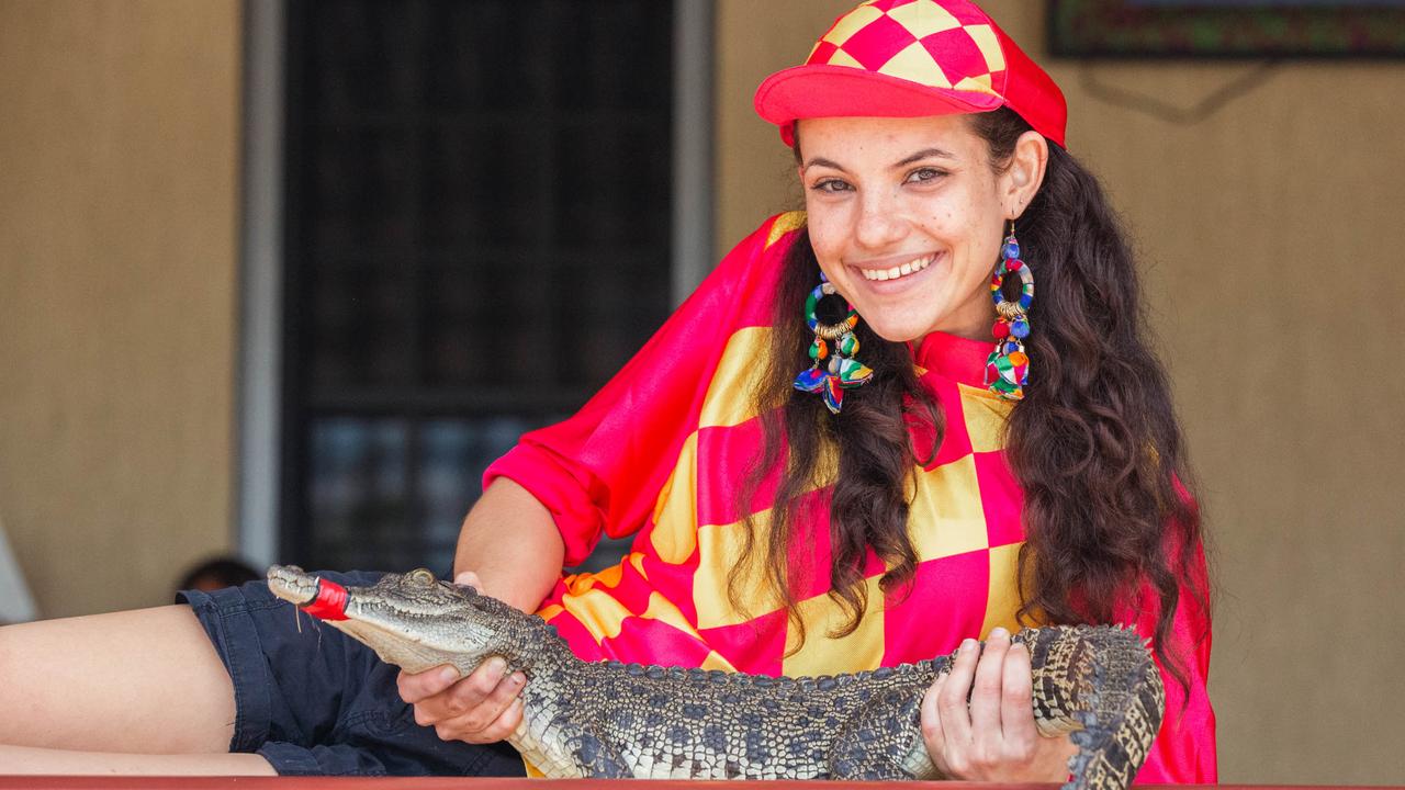 Croc racing at the Berry Springs Tavern for Melbourne Cup Day: Bartender and ‘jockey’ Gypsy Cass with one of the competing crocs. Picture: GLENN CAMPBELL