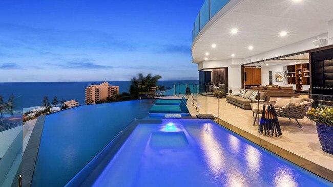 The pool at 31 Pacific Heights Court, Coolum Beach, is a sea of blue.