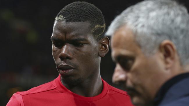 Manchester United's sacked manager Jose Mourinho, right, with star player Paul Pogba.