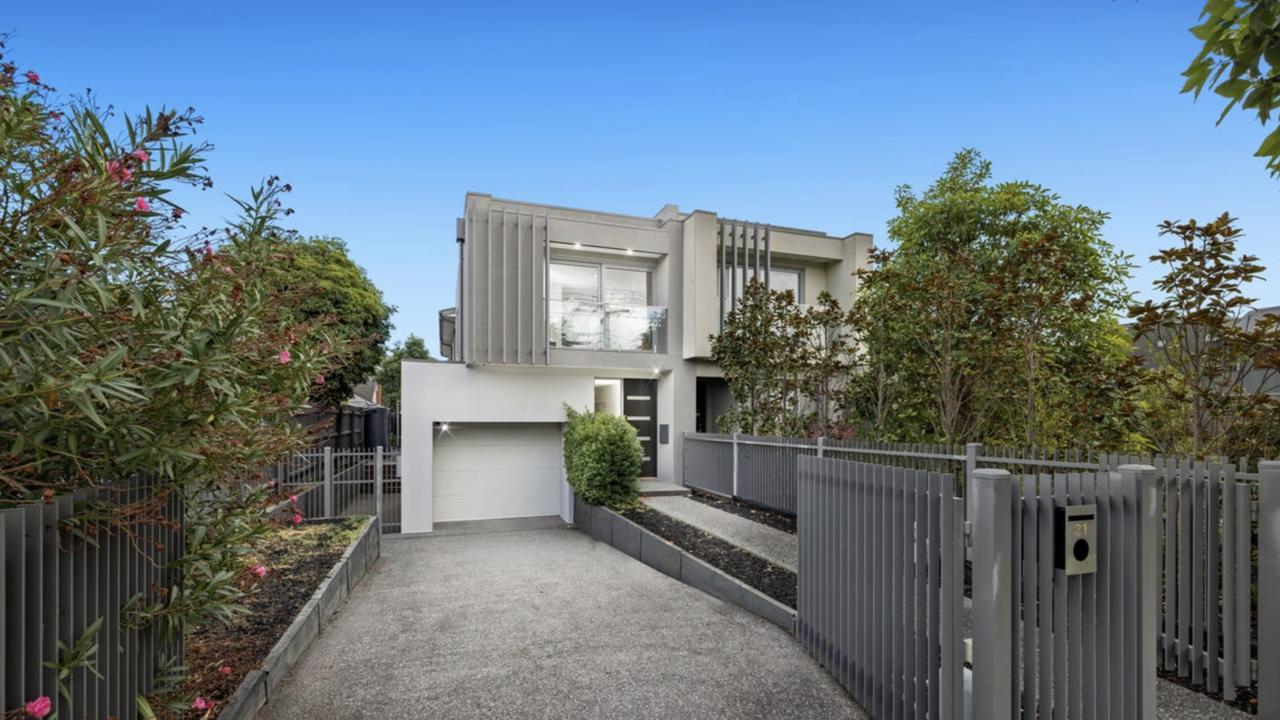 The bold facade, secure electric gate and contemporary design give this townhouse standout street appeal.