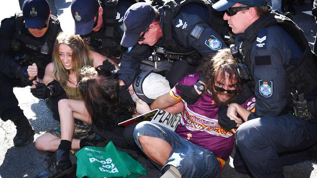 Police arresting Extinction Rebellion protestors in Brisbane’s CBD on August 6. Picture: Darren England/AAP