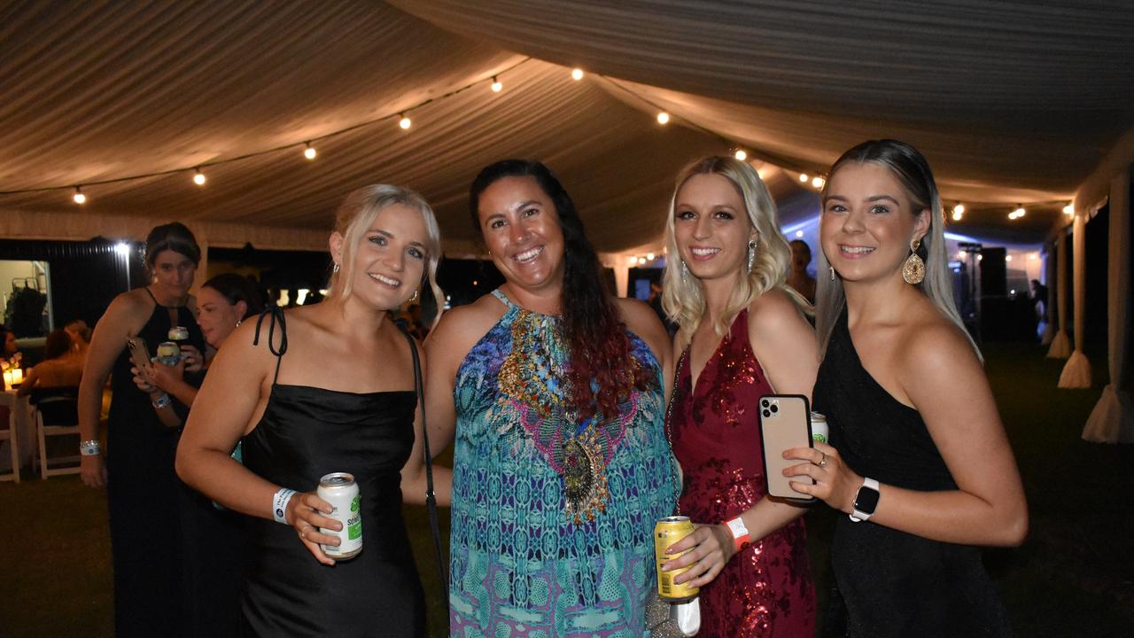 Shanaee Morrow of Wilson Beach, Kate Thomson of Jubilee Pocket, Brianna Ganter of Cannonvale, and Trinity Youd of Cannonvale at the 2021 Proserpine Show Ball. Picture: Kirra Grimes.