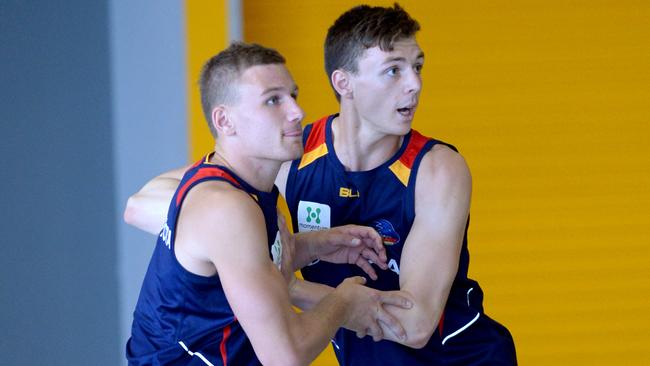 Jake Lever (right) does some competitive drills at Adelaide Crows training. Picture: Naomi Jellicoe