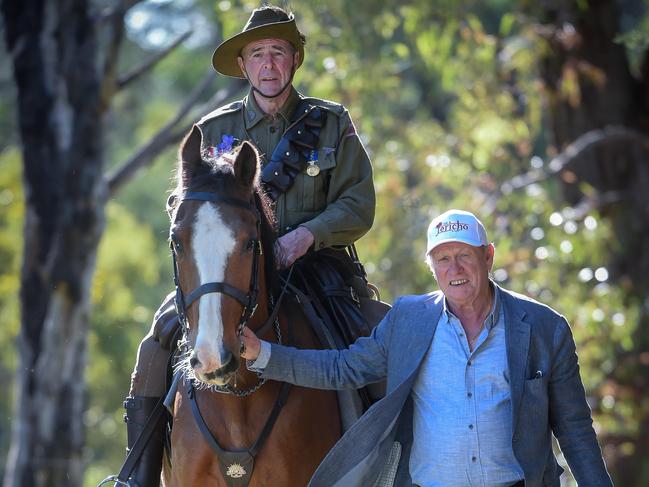 Bill Gibbins and Bernie Dingle (in WWI Lighthorseman uniform) and Drifter the 30-year-old Clydesdale X Thoroughbred at the Lighthorse Museum in Nar Nar Goon. Picture: Jay Town