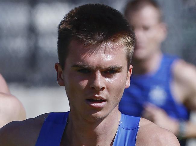 NCA. MELBOURNE, AUSTRALIA. 11th November 2024. AFL.  North Melbourne training at  Arden St oval.   Colby McKercher on his way to comfortably winning the 2km time trial on the first official day back for the 1-4 year players .  Picture: Michael Klein