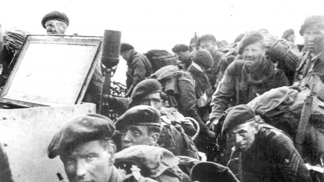 British commandos on the run to the Normandy beach on D-Day.