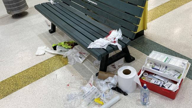 The crime scene in Vincent Shopping Centre after a stabbing took place. The victim, Gabriel Smallwood, was rendered first aid by Woolworths staff members on the bench before he was transported to hospital. Picture: Leighton Smith