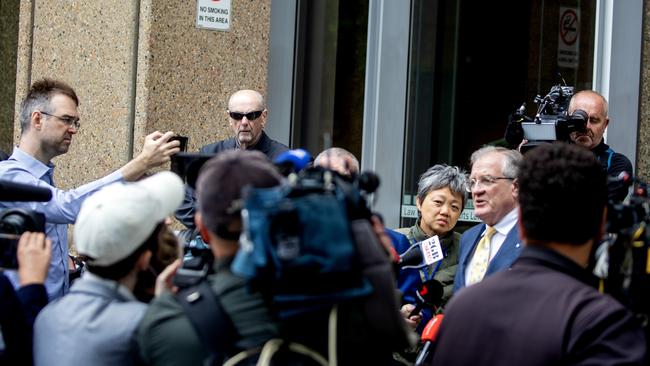 Peter Dawson watches on as Greg Walsh SC speaks with the media. Picture: Liam Mendes/The Australian