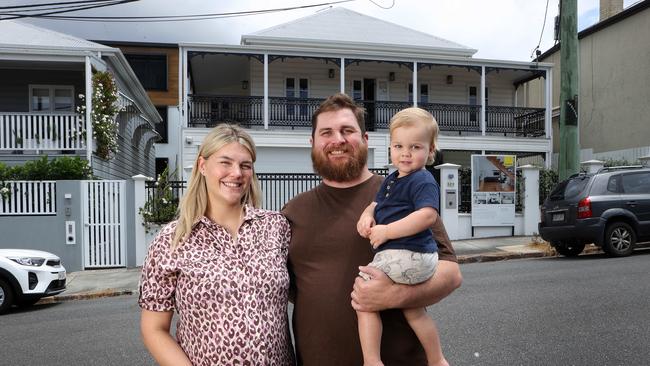 Alex Hansen, 33, and wife Annabelle, 30, with their son Ted, 2, are selling their New Farm house and are hoping to ger more bang for their buck at Clayfield or Hendra. Picture: Liam Kidston.