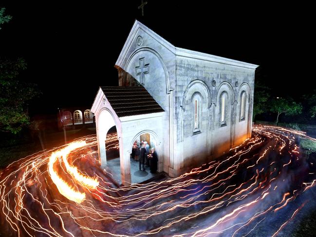 Devotees gather near a church before the ancient game of Lelo Burti begins in Shukhuti, Georgia, during Orthodox Easter celebrations. This traditional, intense game has no time limits or referees, and honours the Gurian victory over the Ottomans. Picture: Giorgi Arjevanidze/AFP