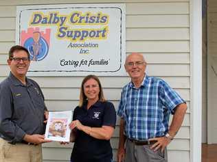 HELPING HAND: Past Lions president Roger Henderson presents a donation to family support worker Irene Tanks and committee member Paul Moys. Picture: Shannon Hardy