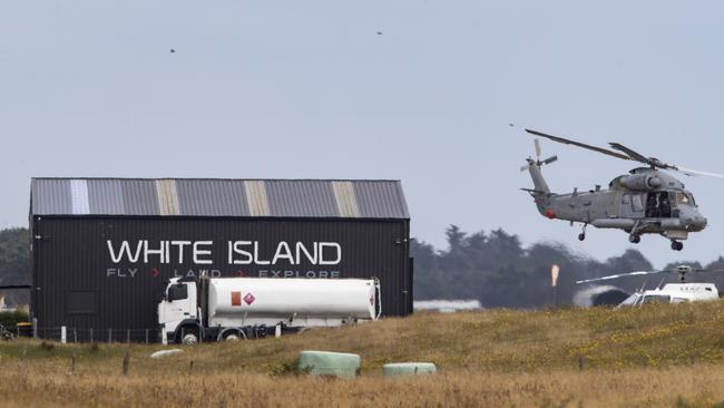 A Royal New Zealand Air Force helicopter takes off from Whakatane Airport to return to White Island to retrieve bodies. Picture: Getty