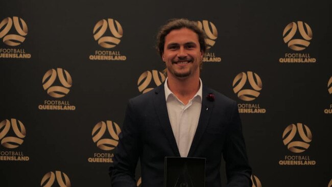 Defender Oskar Dillon with his NPL Young Player of the Year award. Supplied.