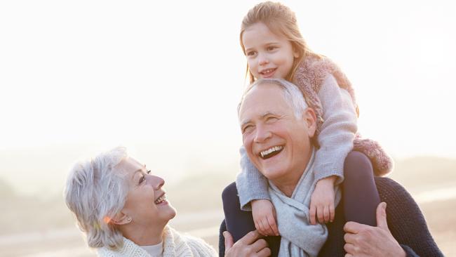 Grandparents cuddling their grandchildren before COVID-19 outbreak. Picture: Supplied.