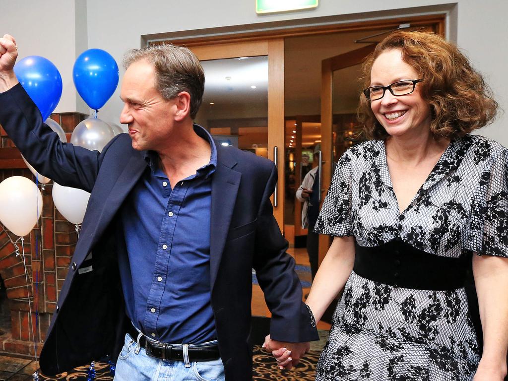 Greg Hunt arrives at his election party in Rye with wife Paula. Picture: Mark Stewart
