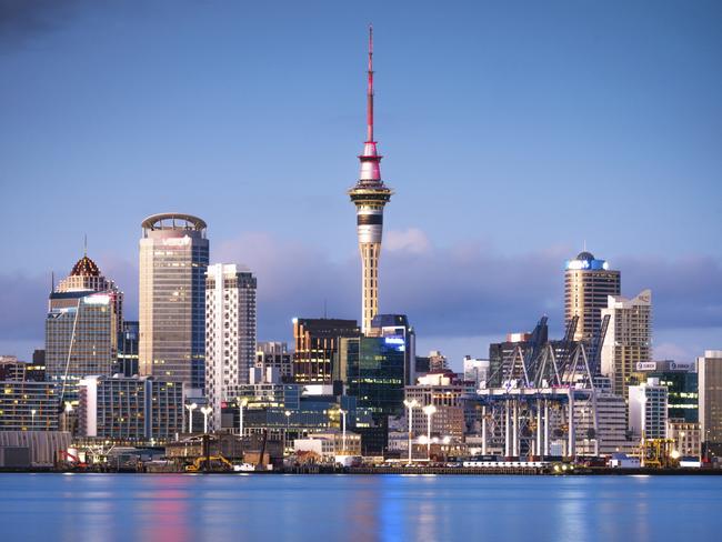 ESCAPE: CRUISE NEWS, June 5 .. Auckland's CBD seen from across the water at dawn, with the SkyTower in the centre. Picture: iStock