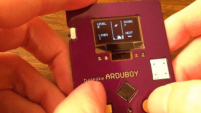 The Arduboy business card takes networking to the next level with a built-in screen and a