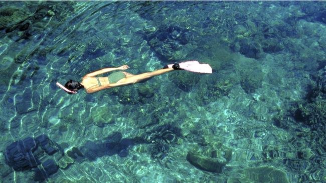 A snorkeller at Lagen Resort, Palawan.