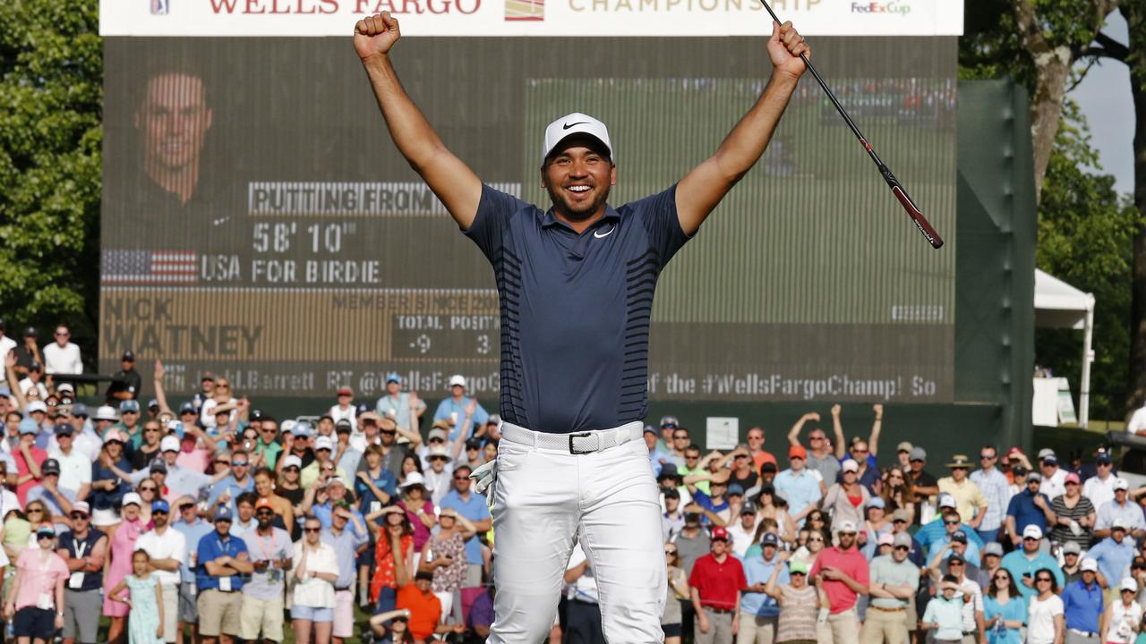 Jason Day celebrates.