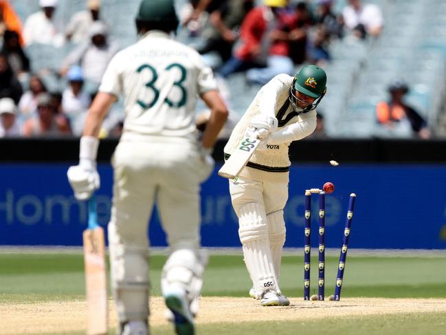 Usman Khawaja is knocked over by Mohammed Siraj on day four of the fourth Test. Picture: Martin Keep/AFP