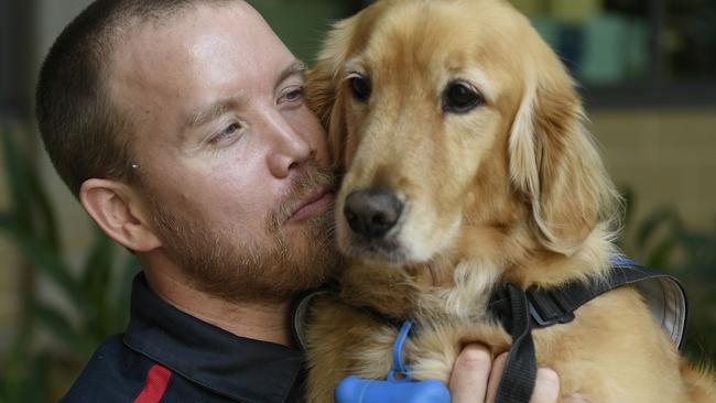 Townsville University Hospital biomedical technician Thomas O’Flaherty and assistance dog Summer. Picture: Supplied