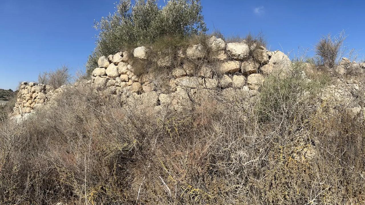 Ruined walls are visible today at the site of the camp. Picture: Steve Compton