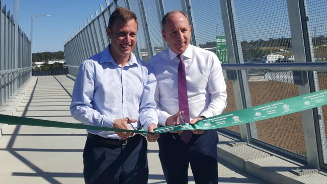 Health Minister Steven Miles and Federal LNP MP for Petrie Luke Howarth cut the ribbon to officially open the Boundary Rd overpass last year.