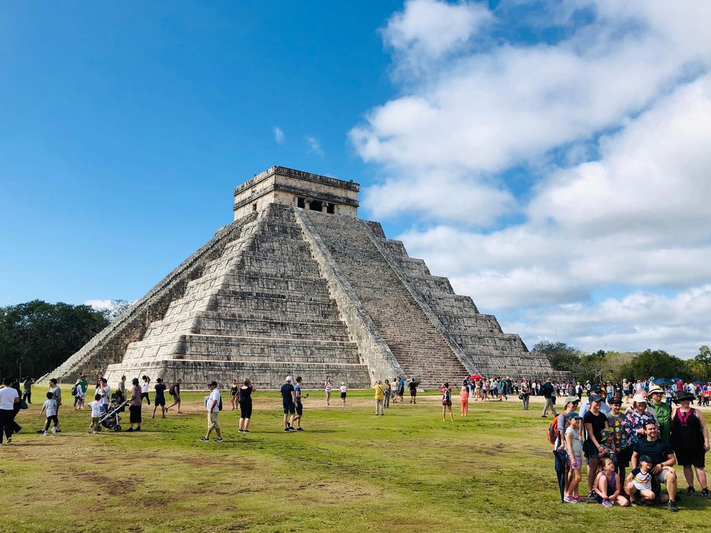 People visit the Kukulcan Pyramid at the Mayan archaeological site of Chichen Itza in Yucatán State, Mexico. Picture: Daniel Slim 