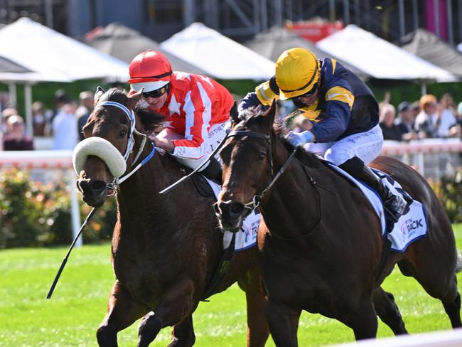 MELBOURNE, AUSTRALIA - SEPTEMBER 07: Jamie Kah riding A Little Deep defeating Arkansaw Kid and Desert Lightning in Race 5, the Off The Track Chautauqua Stakes - Betting Odds during Melbourne Racing at Moonee Valley Racecourse on September 07, 2024 in Melbourne, Australia. (Photo by Vince Caligiuri/Getty Images)