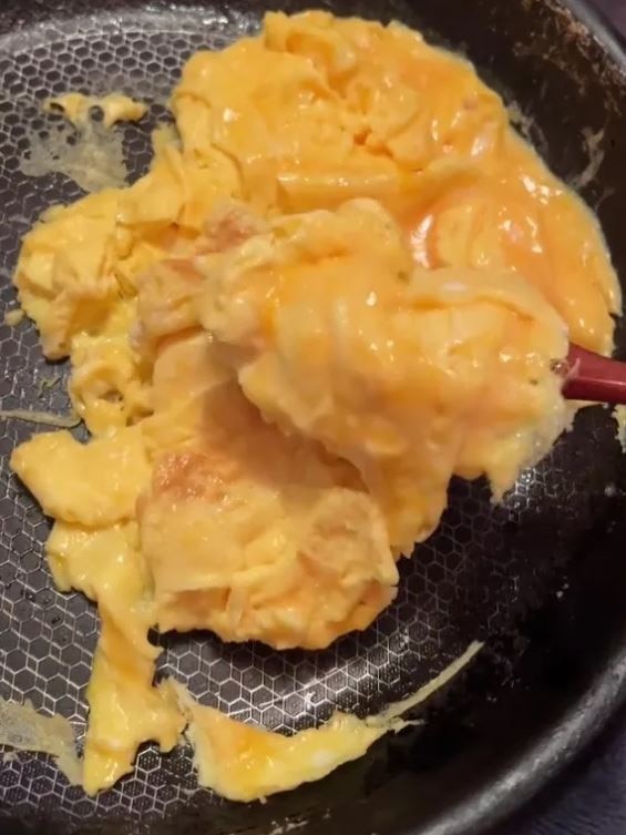 After a block of butter, she had 10 lightly scrambled eggs. Picture: TikTok