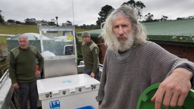 Fisherman David Osborne, Shane Dixon and Craig Garland are fed up with the relocation of seals into their fishing grounds. Picture: Grant Wells