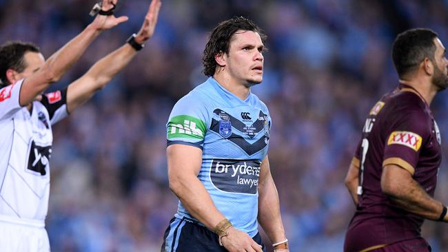 James Roberts is sent to the sin bin but the Blues defence held strong. (AAP Image/Dan Himbrechts)