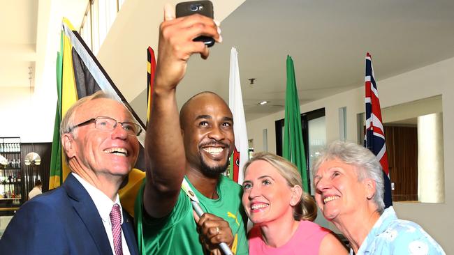 Dalton Myers from Jamaica takes a selfie with Goldoc chairman Peter Beattie, Games Minister Kate Jones and Commonwealth Games Federation President Louise Martin. Picture Glenn Hampson